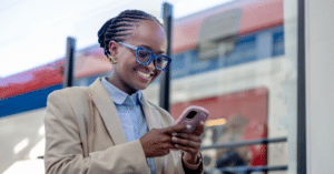 Woman browsing the BlueSky app on her smartphone